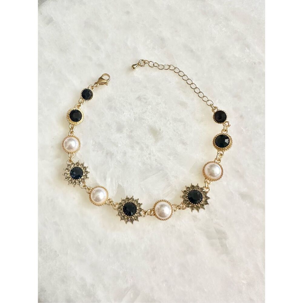 Dark blue sapphire rhinestone with gold chain-link with pearl regal style bracel